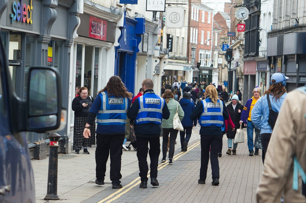 store detective observing crowd